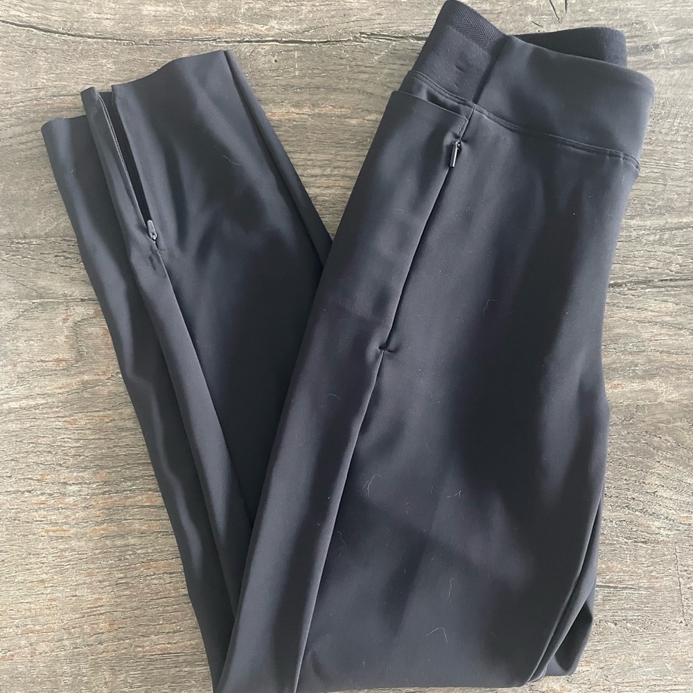 Athleta NWT stellar tight in black .  Petite zero.